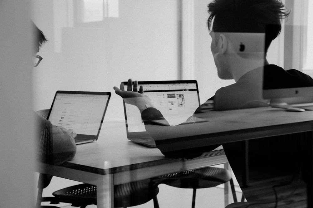 Colleagues reviewing work